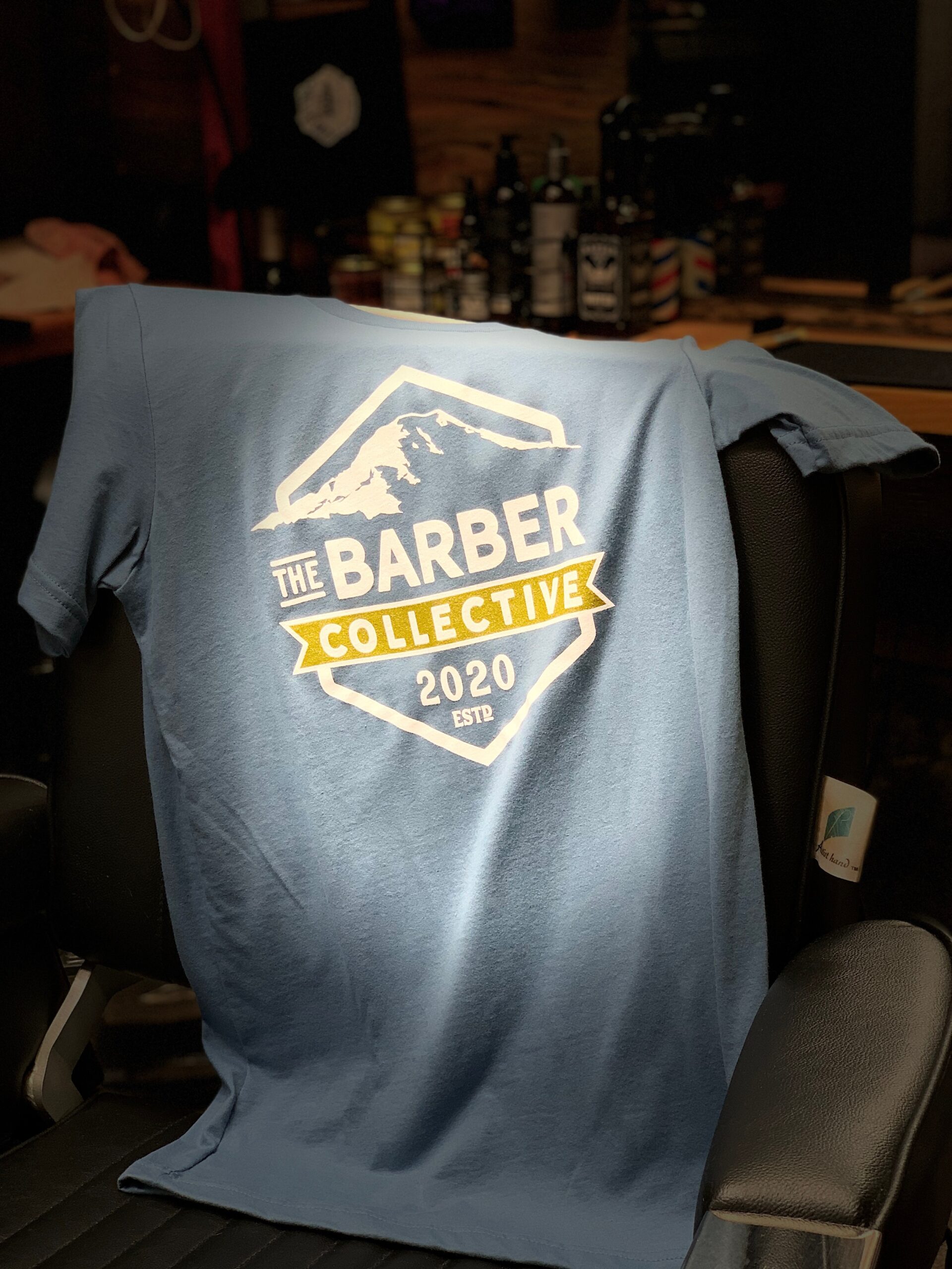 The Barber Collective's first t-shirt, draped over Georgette's shop chair